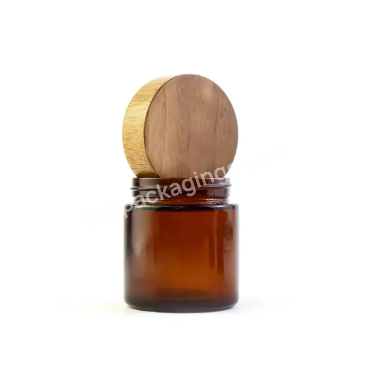 2 Oz 3 Oz Amber Avoid Light Child Resistant Glass Jar With Walnut Lid For Oil Food Storage