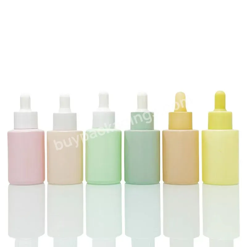 30ml 50ml 100ml Customized Colorful Cosmetic Packaging Serum Oil Body Cream Skincare Flat Shoulder Glass Bottle With Lid