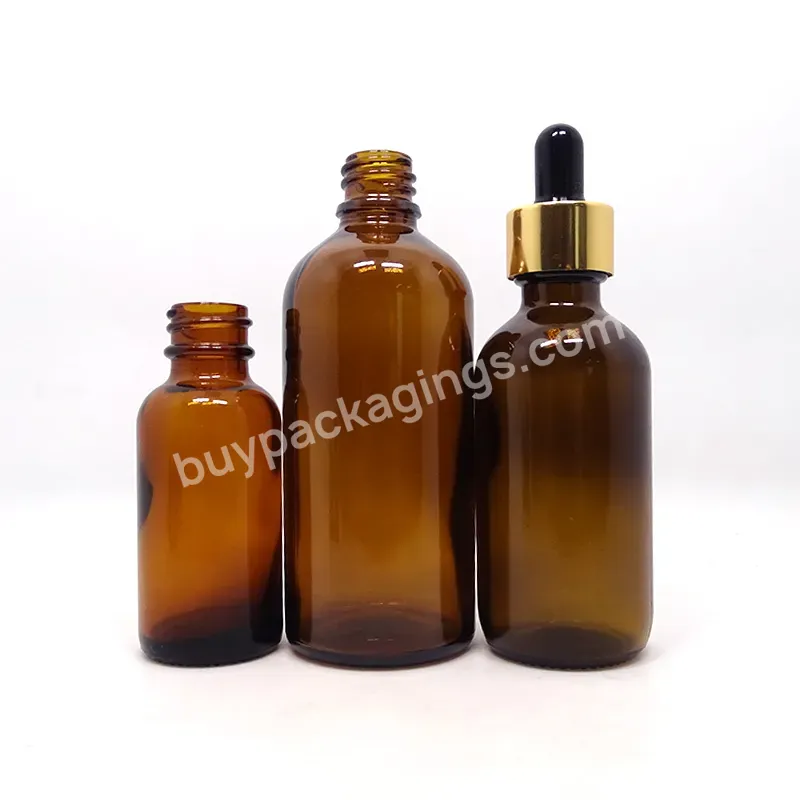 5ml 10ml 15ml 20ml 30ml 50ml 100ml Amber Empty Round Glass Bottles With Aluminium Gold Cap For Facial Cosmetic