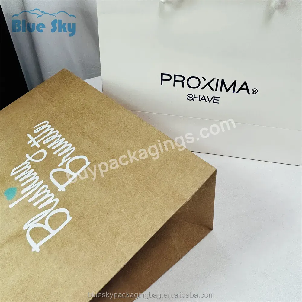 Blue Sky 2023 Factory Custom Kraft Paper Bags With Your Own Personal Logo Shopping Gift Color Printed Paper Bags