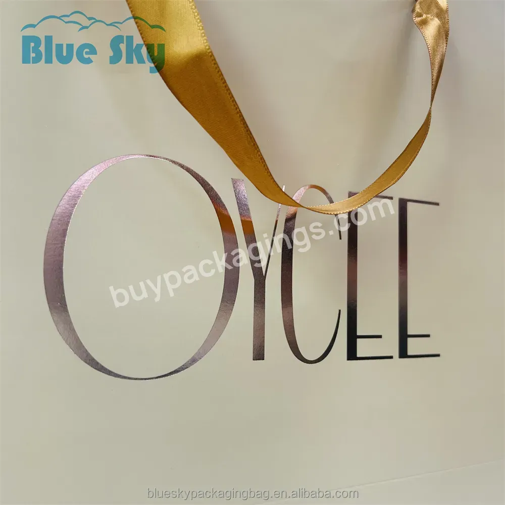 Blue Sky Gold Foil Paper Bag Custom Printed Logo Luxury Clothing Shopping Paper Bag Boutique Recyclable Gift Bag Ribbon Rope