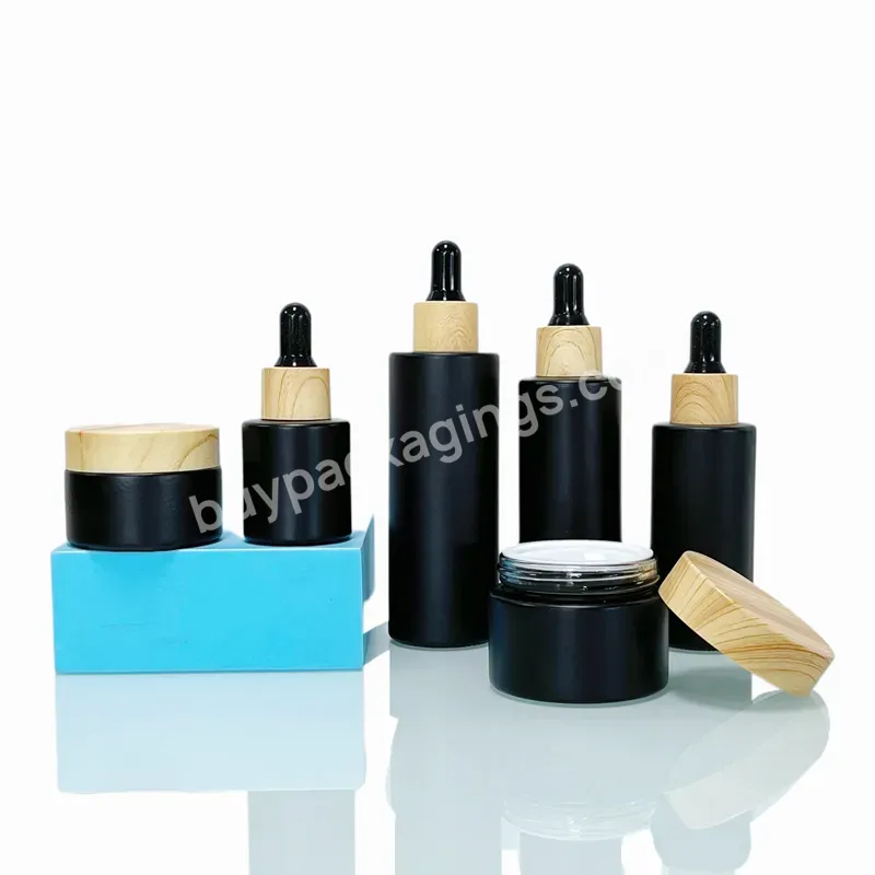 Bulk Price Frosted Black Matte Amber 50ml Protect From Light Cream Jars With Bamboo Plastic Cover Glass Bottles