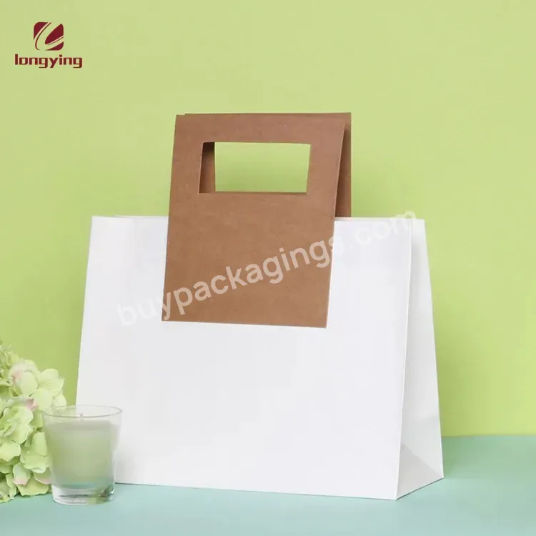 China Custom Luxury Creative Paper Bag With 700gsm Cardboard Paper Handle For Shirt Jeans Jackets Clothing Apparel Packaging Bag