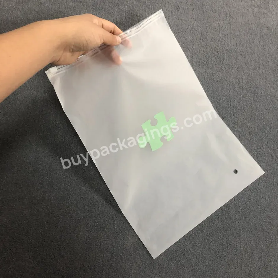 China Manufactory Frosted Custom Logo Matte Clear Plastic Packaging Zipper Bags For Clothing