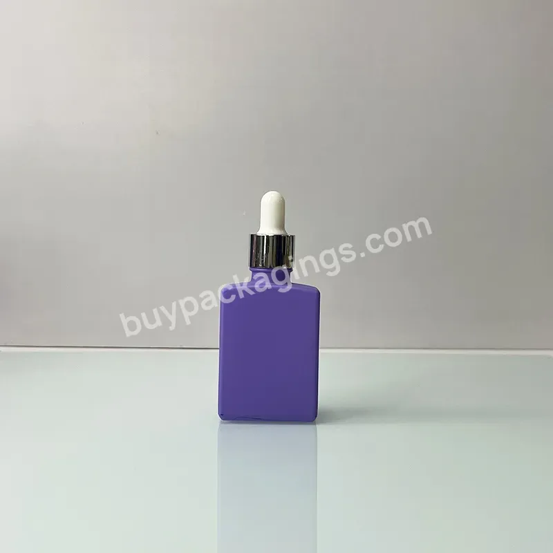 China Manufacturer Empty 30ml 50ml 100ml Matte Black Essential Oil Round Glass Dropper Bottle With Dropper Lids