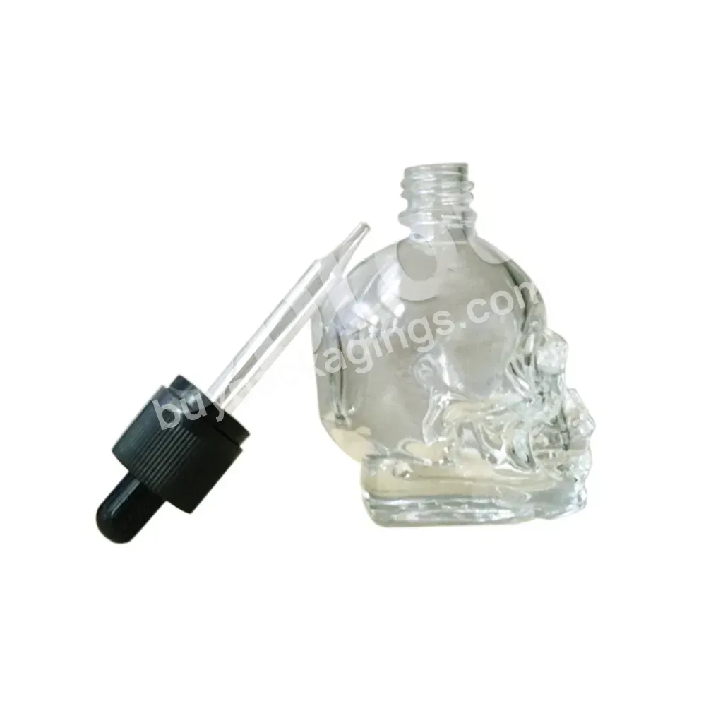 China Supplier Skull Dropper Bottle,Unique Shaped Clear Glass Bottles Skull For Liquid Essential Oils