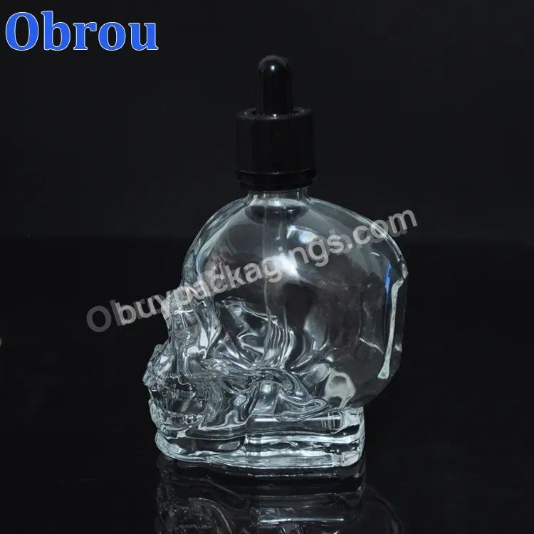 China Supplier Skull Dropper Bottle,Unique Shaped Clear Glass Bottles Skull For Liquid Essential Oils