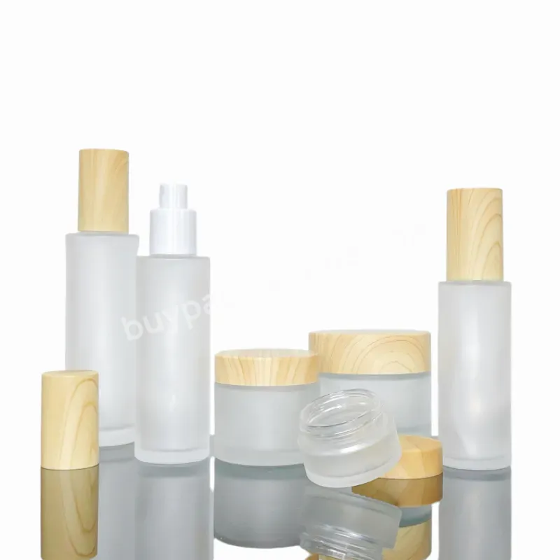 Cosmetic Packaging Set Full Size Frosted Glass Bottles For Lotion With Wood Grain Cover Bamboo Cosmetic Packaging Bamboo Lid