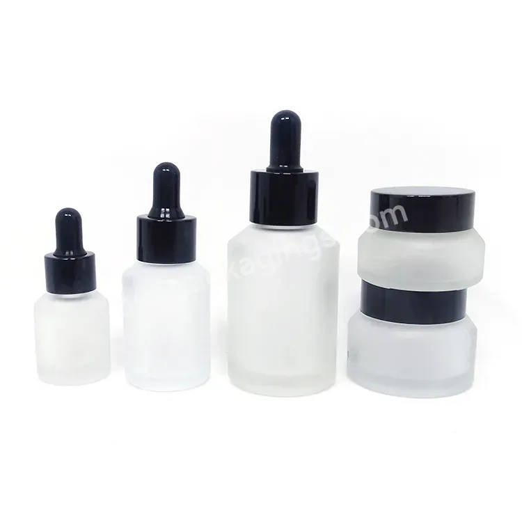 Cosmetic Packaging Slant Shoulder Skin Care Set Frosted Glass Bottle Cosmetic Products With Black Dropper And Jar With Lid