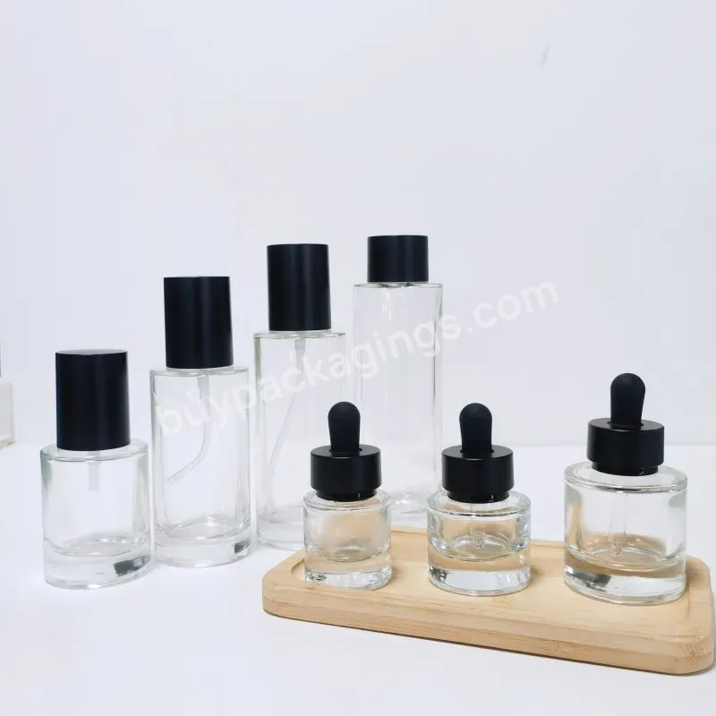 Cosmetic Packing Bottle Set 10ml-150ml Flat Shoulder Transparent Empty Lotion Pump Spray Glass Bottle With Black Cap