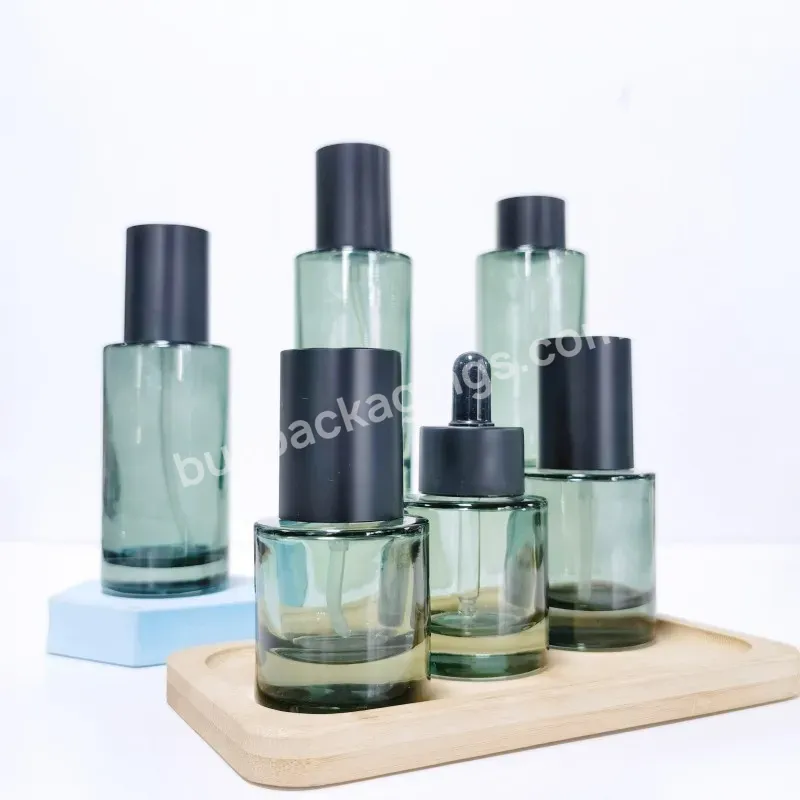 Cosmetic Packing Bottle Set 30ml-150ml Flat Shoulder Green Empty Lotion Pump Spray Glass Bottle With Black Cap