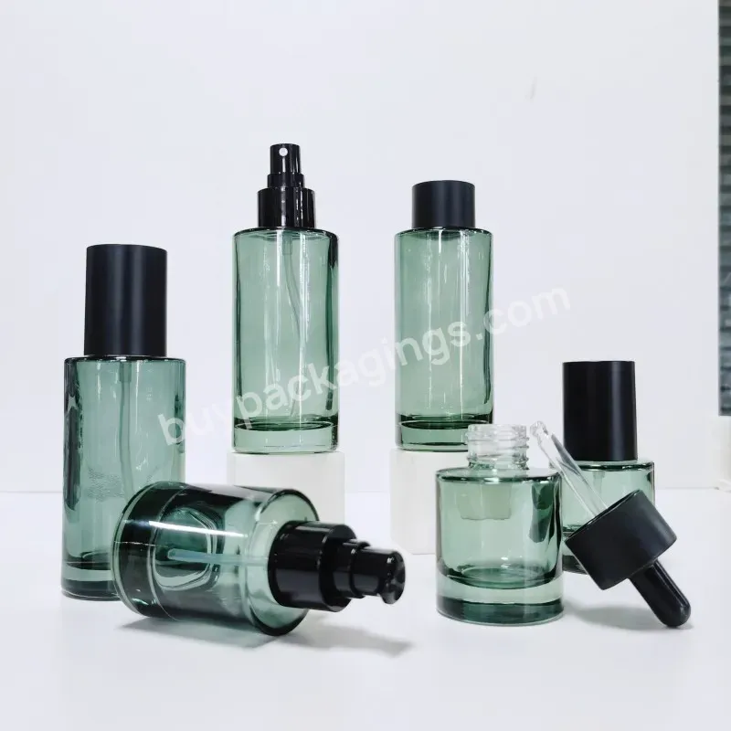 Cosmetic Packing Bottle Set 30ml-150ml Flat Shoulder Green Empty Lotion Pump Spray Glass Bottle With Black Cap