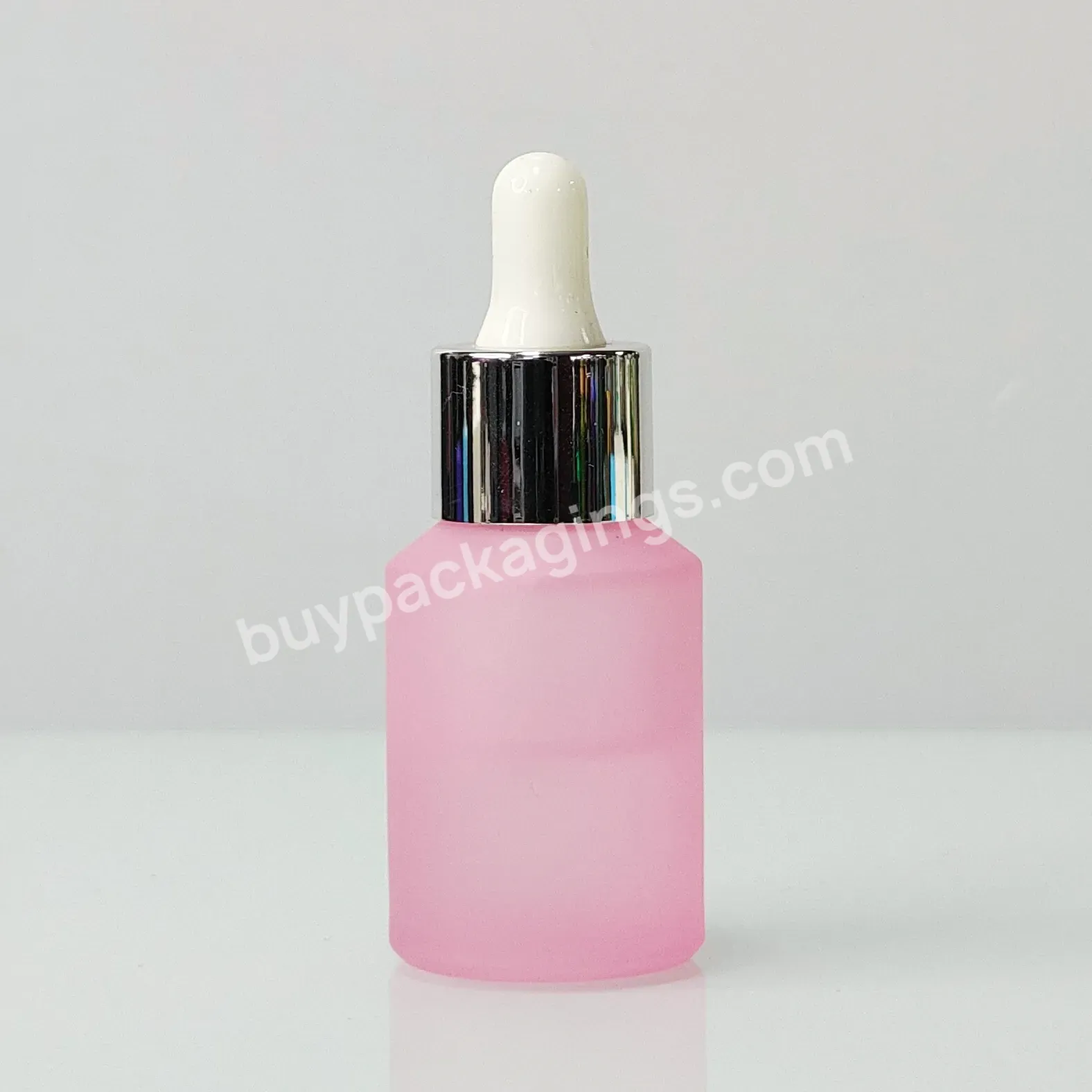 Custom 30ml 50ml 100ml Oblique Shoulder Round Cosmetic Packaging Manufacturers Frosted Pink Glass Bottle With Sliver Ring