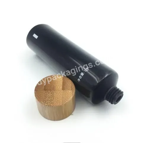 Custom 50mm Diameter 150ml 200ml 8oz Black Pe Soft Tube With Bamboo Screw Lids Empty Pe Cosmetic Squeezed Soft Tube