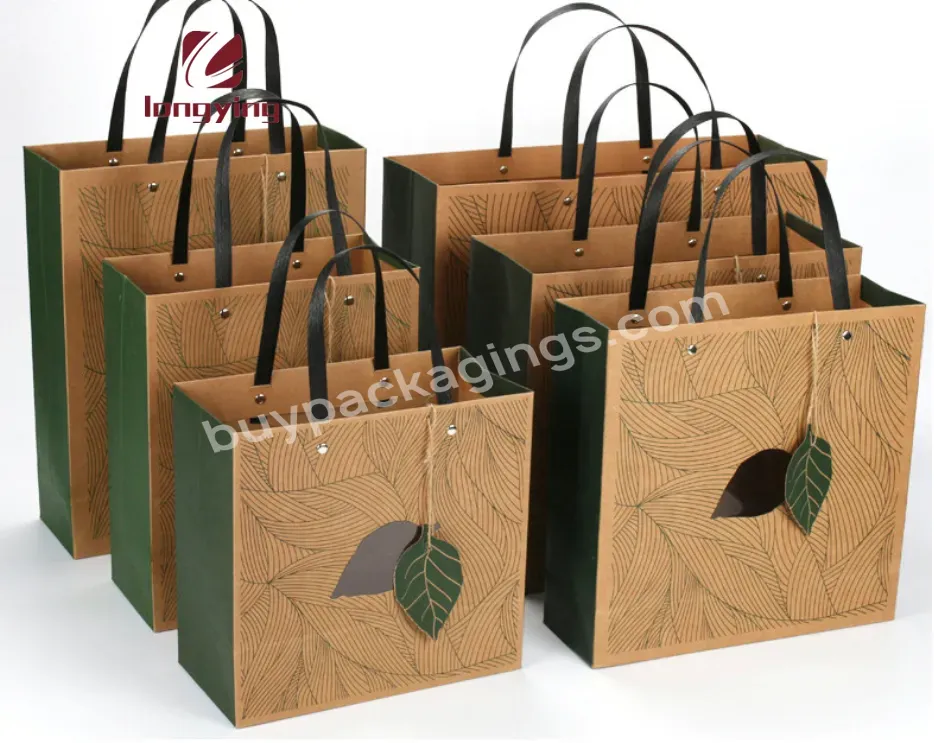 Custom Creative Luxury Hollow Out Bag Kraft Paper Paper With Black Braided Rope Rivet For Clothing Tags Clothing Packaging Bag