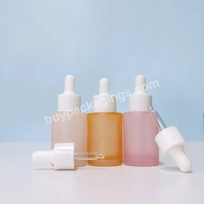 Custom Glass Cosmetic Serum Bottle 30 Ml 1oz White Black Silver Frosted Flat Shoulder Dropper Bottle For Essential Oils