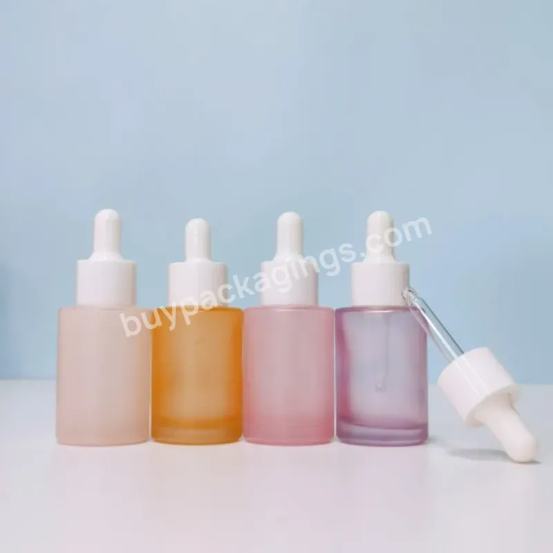 Custom Glass Cosmetic Serum Bottle 30 Ml 1oz White Black Silver Frosted Flat Shoulder Dropper Bottle For Essential Oils