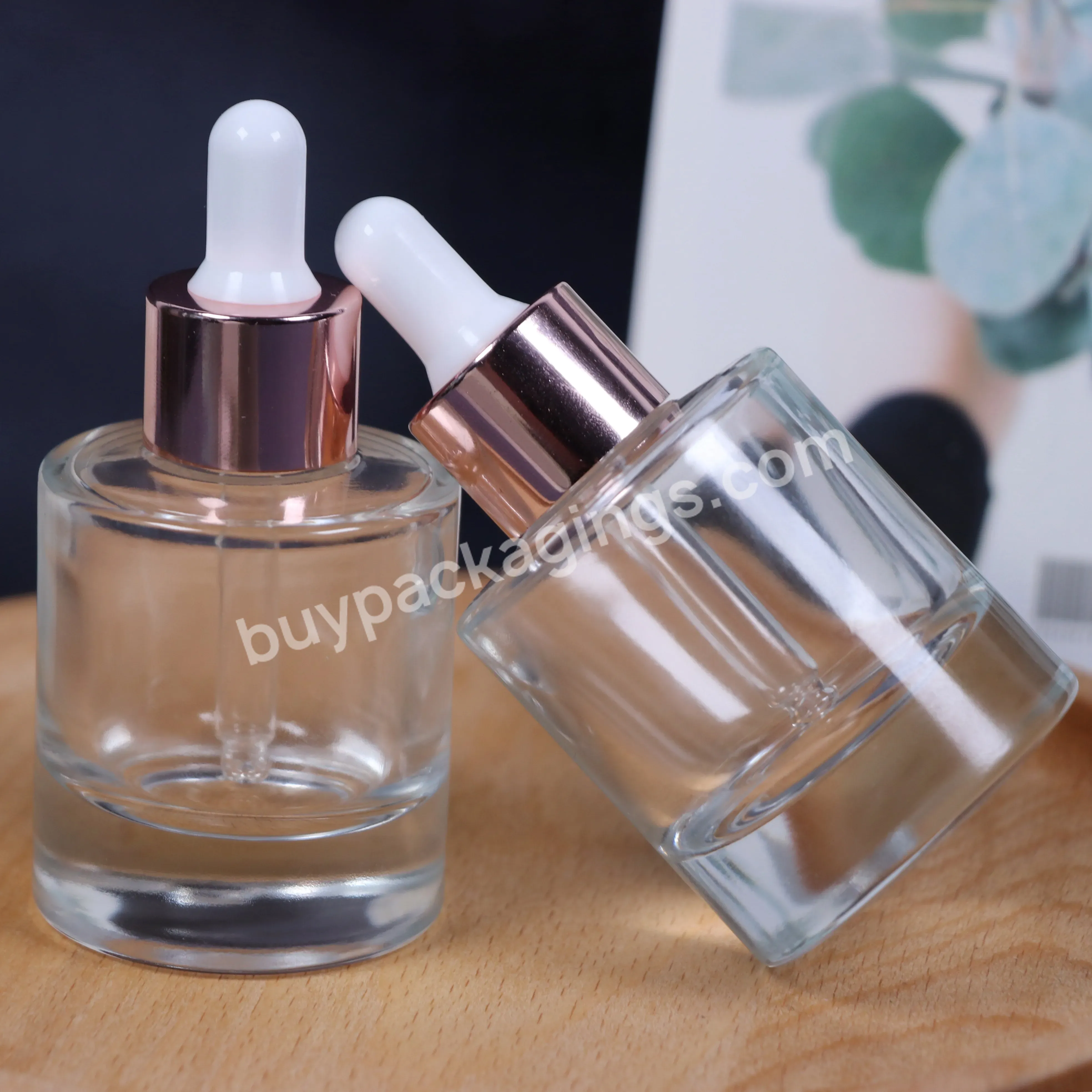 Custom Glass Cosmetic Serum Bottle 30ml Empty Transparent Flat Shoulder Dropper Glass Bottle For Essential Oils