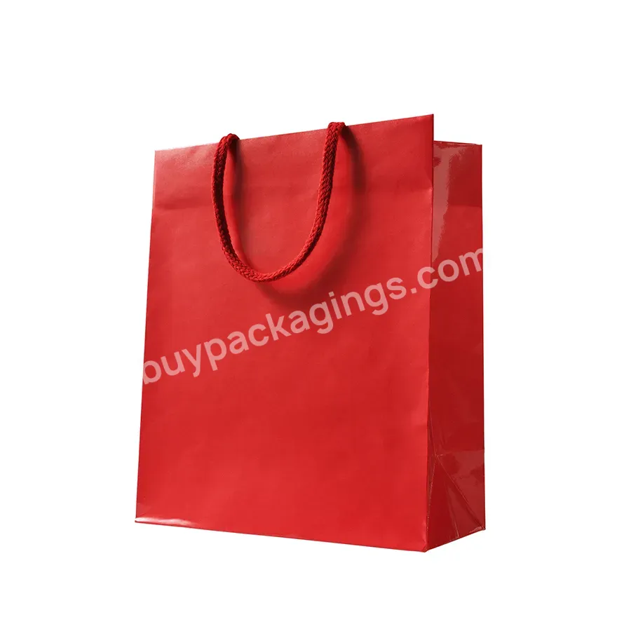Custom Logo Gift Garment Paper Gift Shopping Bags Handle Kraft Paper Bag Waxed Paper Bag