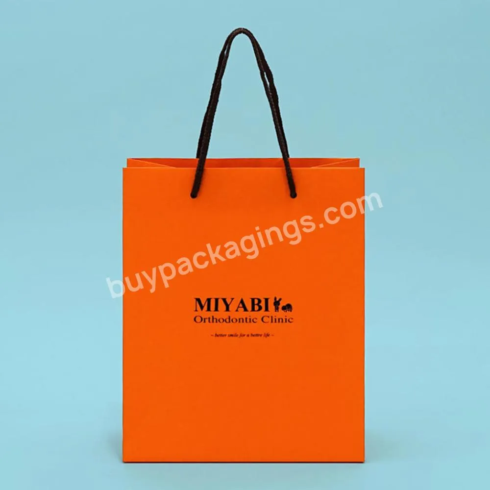 Custom  Logo Luxury Orange Paper Apparel Packaging Gift Shopping Bag Paperbag With Rope Handle