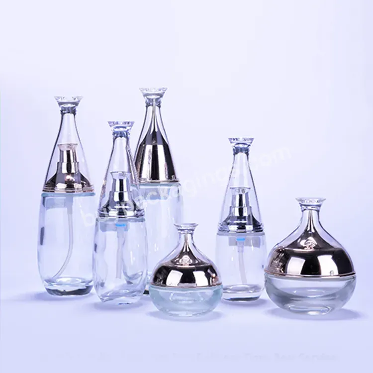 Custom Luxury Clear Cosmetic Glass Pump Bottle 100ml Wholesale Creative Drop Shaped Cosmetic Glass Bottels And Jars