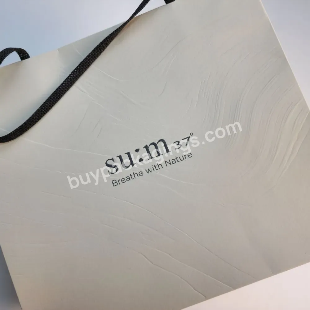 Custom Luxury Embossed Texture Paper Clothing Shoes Paper Gift Bag With Logo Print
