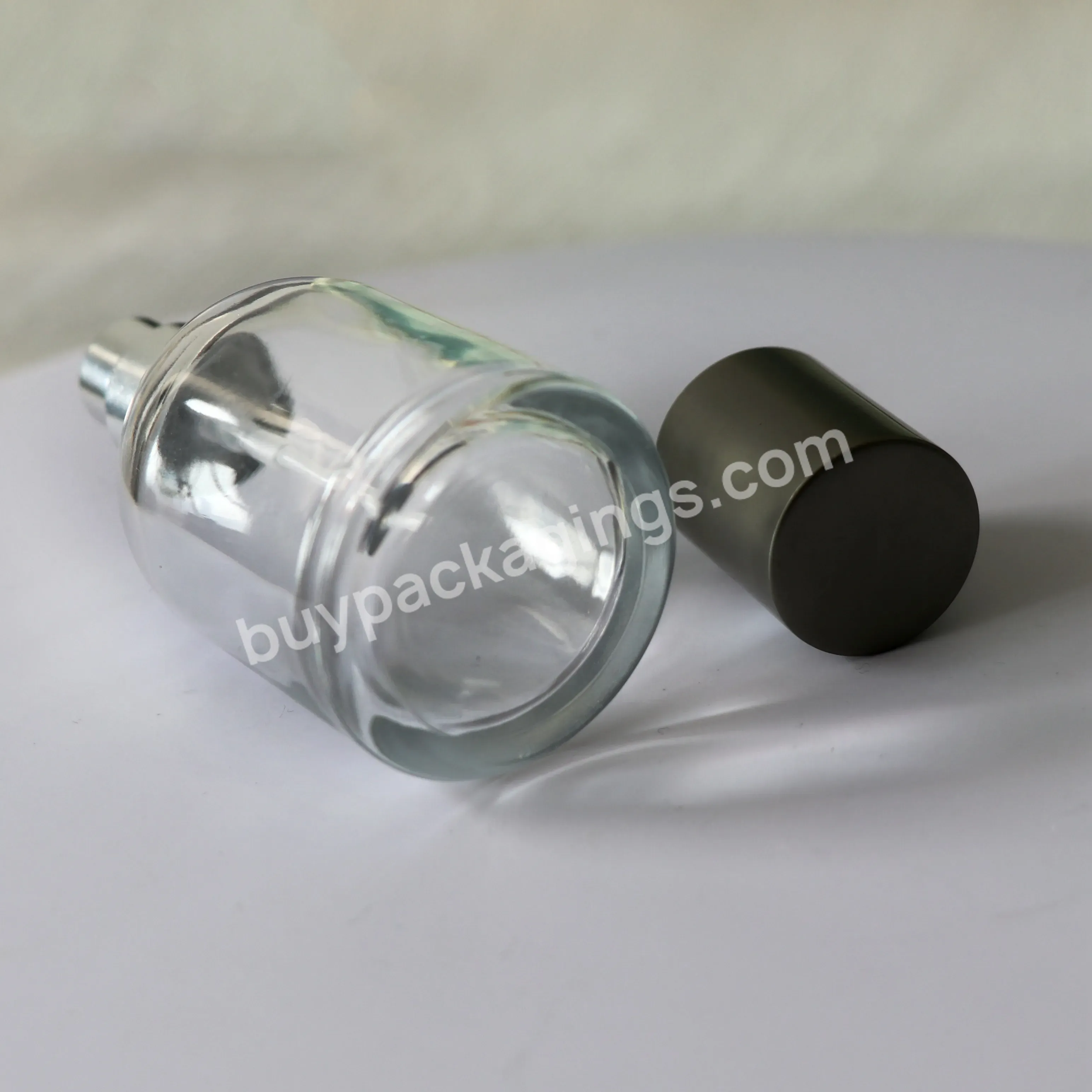 Custom Luxury Empty Thickness Bottom Round Cap 50ml 100ml Clear Glass Round Perfume Bottle