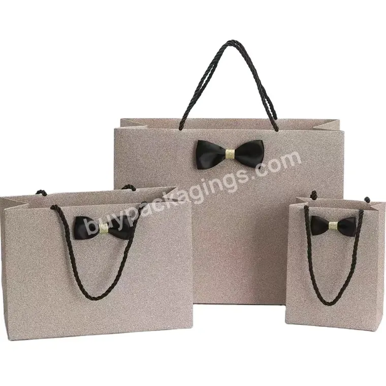 Custom Luxury Golden Rose Paper Bag Glitter Paper Bags Black Bowknot For Beauty Packaging