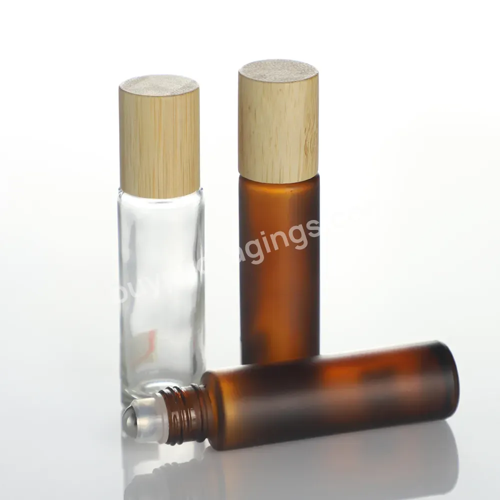 Custom Small 2ml 3ml 5 Ml 6ml 10 Ml 30ml Refillable Empty Bamboo Amber Perfume Eye Cream Essential Oil Glass Roller Ball Bottle