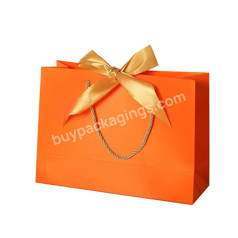 Customize wholesale Bow knot clothing gift bag and shopping gift bag packaging