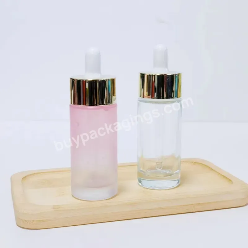 Customized Logo Oil Glass Packing 30ml Gold Silver Round Dropper Empty Hair Oil Glass Dropper Bottles