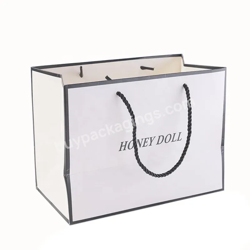 Eco Customized High Quality Paper Shopping Packaging Art Paper Bag With Gold Foil Logo And Rope Handle