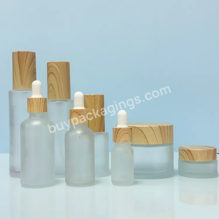 Empty Cosmetic Packaging Frosted Clear Skin Care Glass Cream Jar With Plastic Bamboo Cover