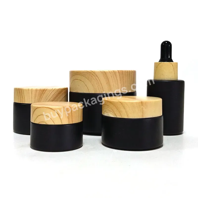 Empty Round Luxury Matte Frosted Black 10ml 20ml 50ml 100ml Glass Cream Jars With Bamboo Plastic Cover Top Lids