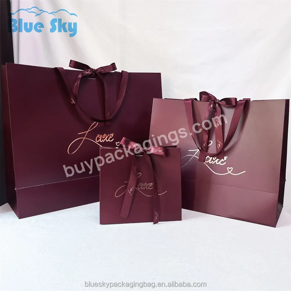 Environmentally Friendly Repeated Use Of Paper Wholesale Custom Printed Bow Paper Bags Printed With Ribbon Shopping Gift Bags