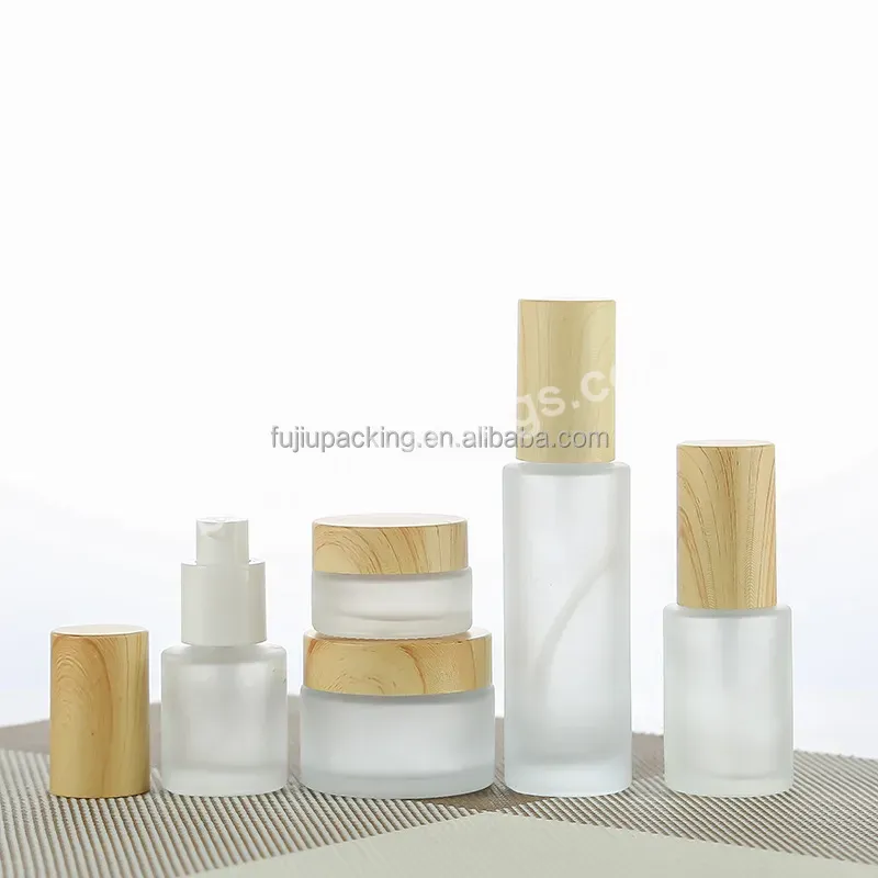 Factory Sales Empty Custom 2oz 4oz 6oz 8oz 50ml 100ml Round Bamboo Top Body Butters Cream Cosmetic Container Frosted Glass Jars