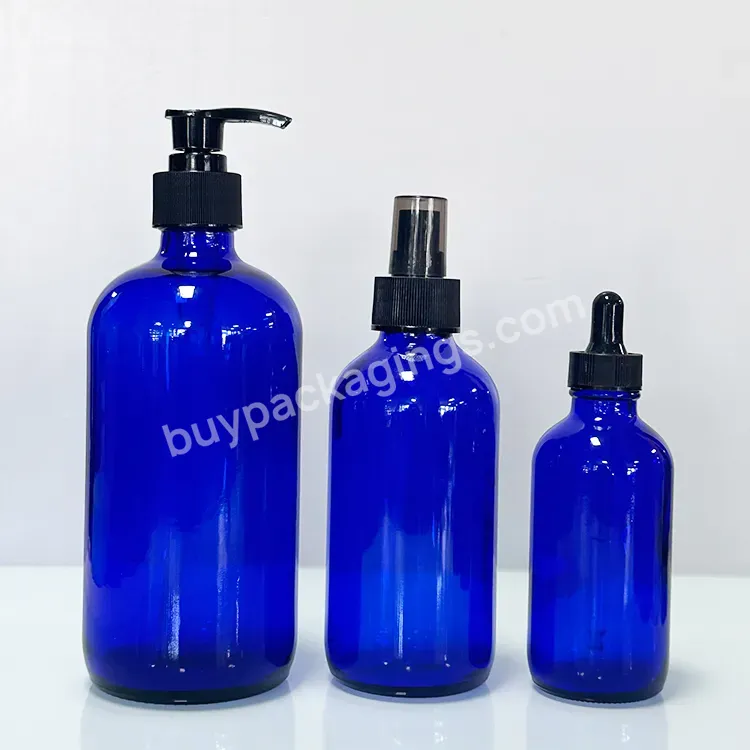 Glass Cosmetic Bottle And Cosmetic Pharmaceutical Glass Bottle Cobalt Blue Glass Bottle And Pump Head Cover