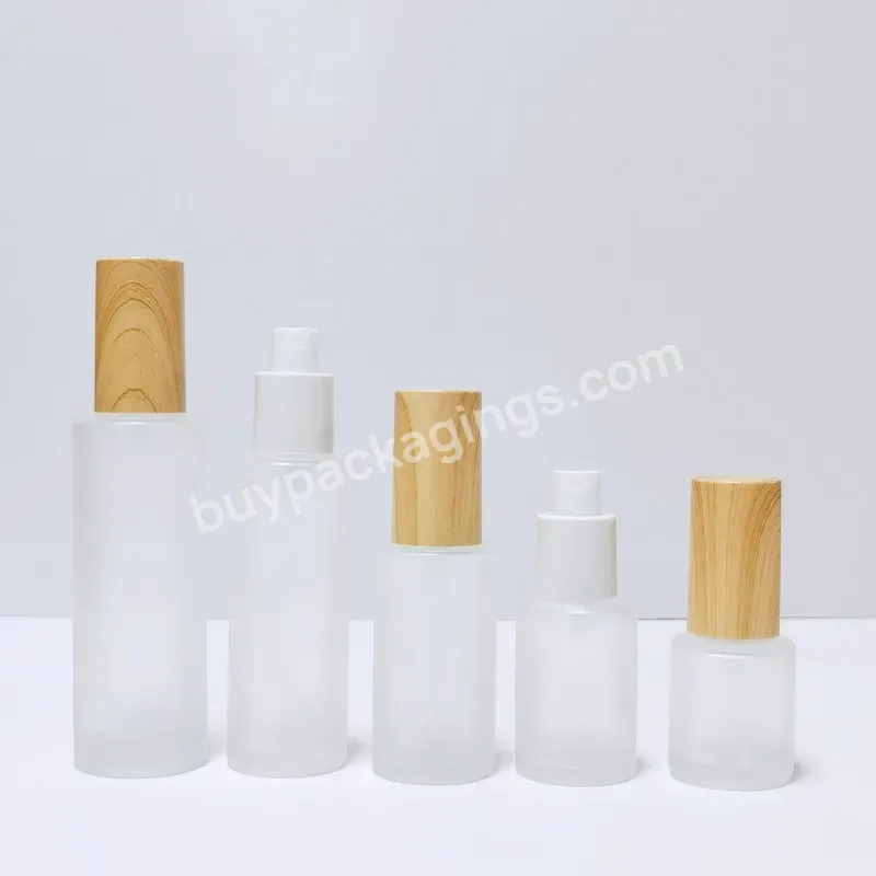 High Quality Cosmetic Plastic Bamboo Frosted Glass Lotion Dispenser Pump Bottle With Bamboo Pump