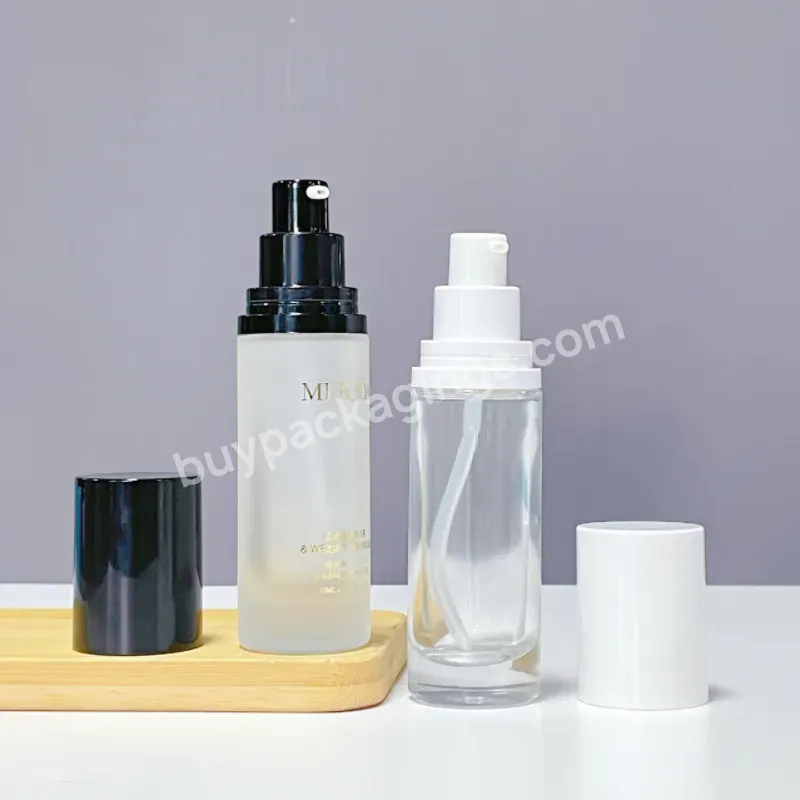 High Quality Skincare Packaging 30ml Thick Bottom Slim Essential Oil Bottle Cylinder Clear Glass Cream Bottle With Pump