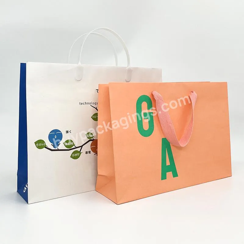 High Quality Wholesale Luxury White Paper Bag Cosmetic Shopping Gift Color Custom Printed Logo With Ribbon Handles