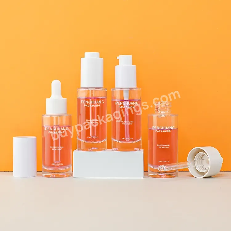 Hot Sale Round Glass Packaging Essential Oil Dropper Bottles With Pump Cap 30 Ml Glass Serum Bottle