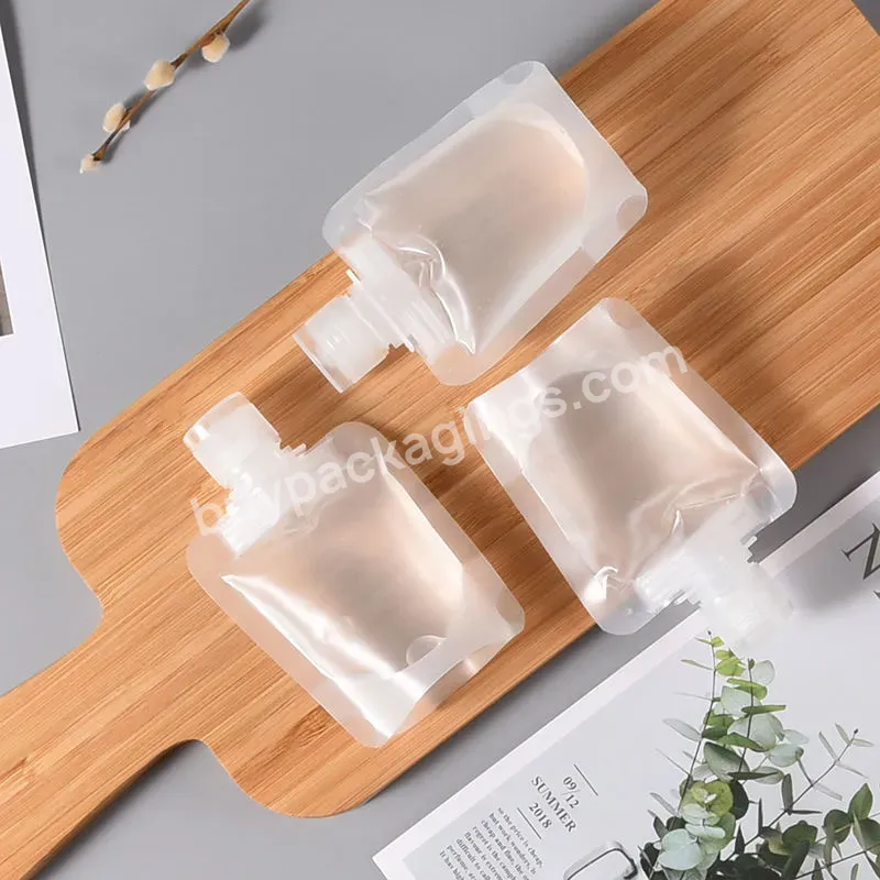 Hot Sell 30ml 50ml 100ml Matte Transparent Stand Up Plastic Spout Liquid Pouch For Shampoo Cosmetic Spout Pouch Flip Top