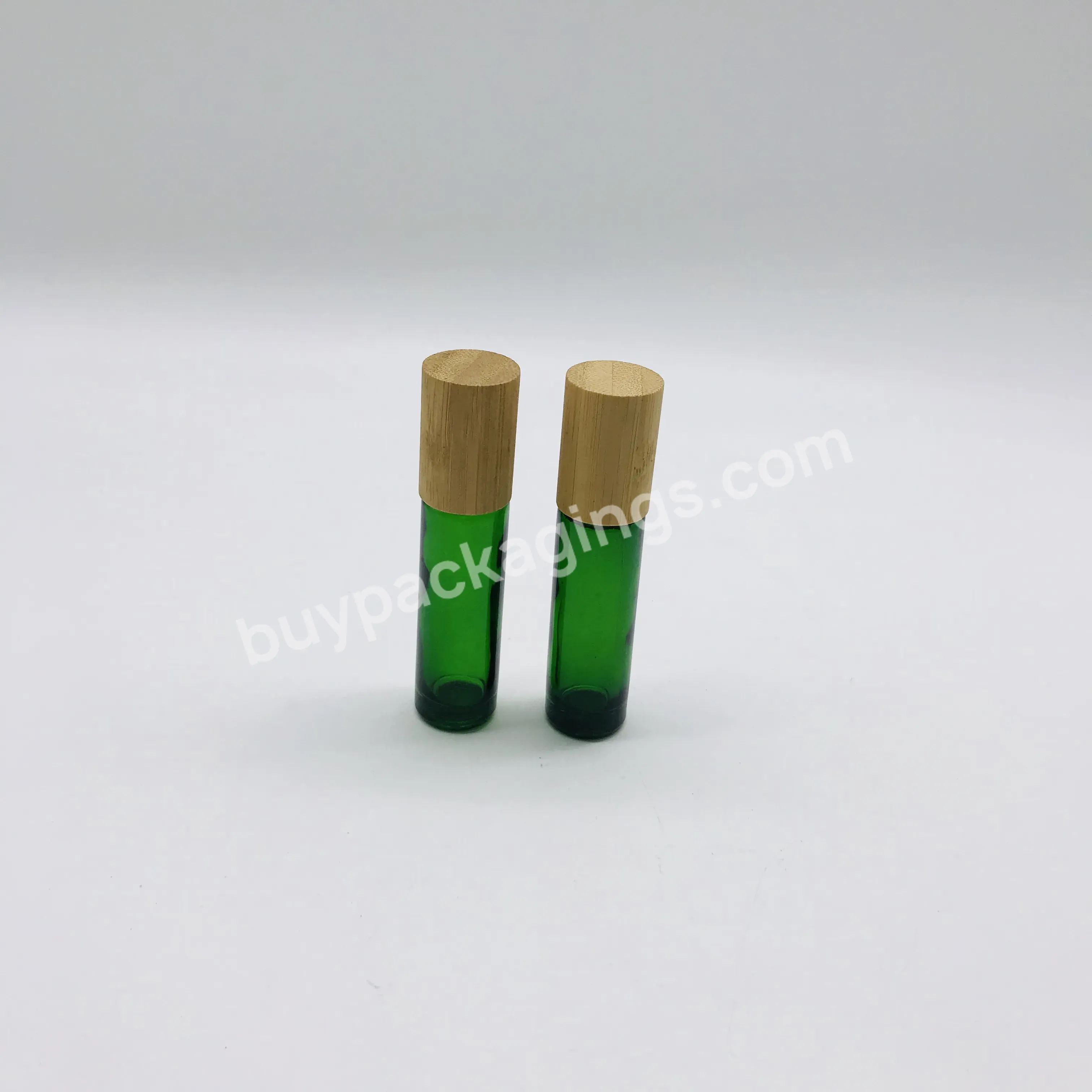 Hot Sell Green Glass Roll On Bottle Bamboo Lid Glass Roller Essential Oil Perfume Bottle 5ml 10ml