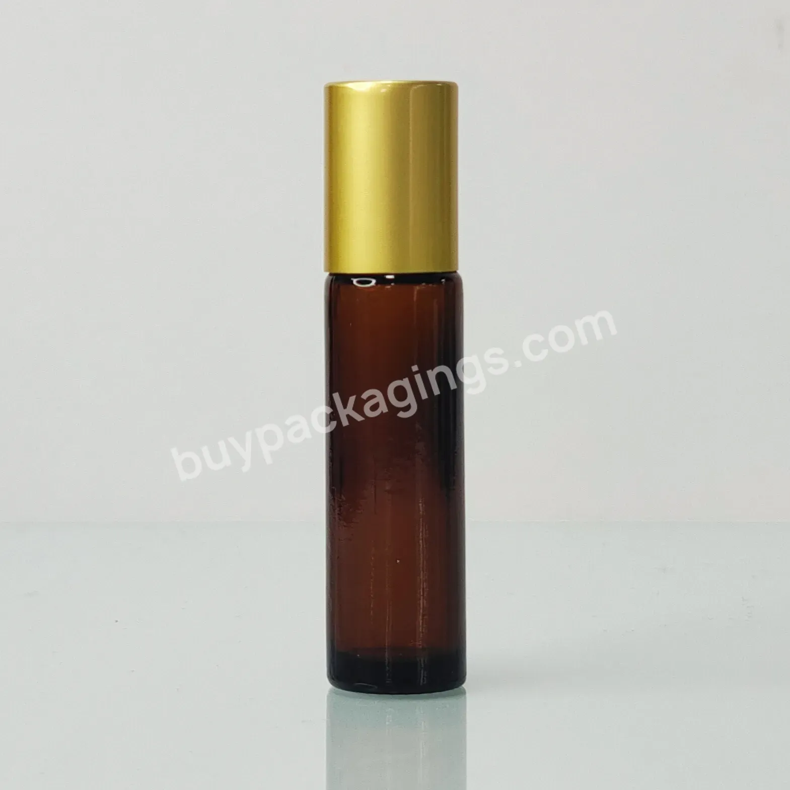 Hot Selling 10ml Frosted Amber Glass Essential Oil Roll-on Bottle Steel Roller Ball With Gold Aluminium Cover