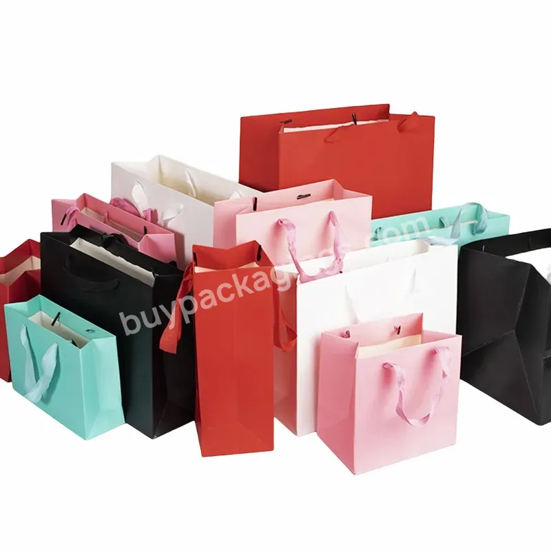 Hot Selling Custom Paper Bags With Your Own Logo Chinese Professional Manufacture Supplies Ivory Board Paper Bags