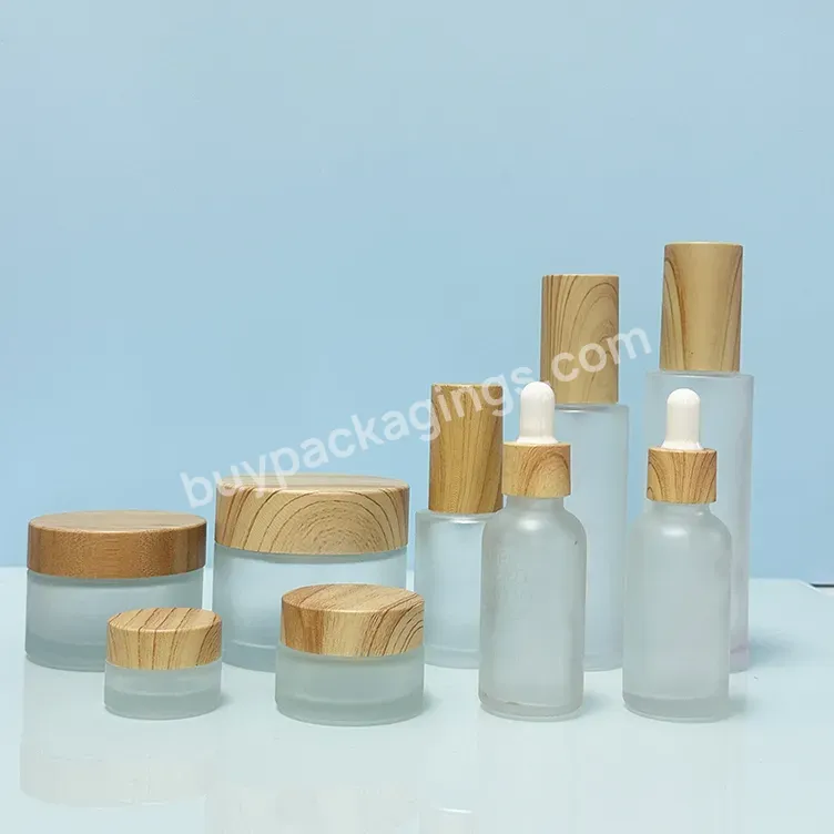 Luxury 1oz 2oz Transparent Glass Jar Cosmetic 30g 50g 100g 200g Glass Cream Jar With Plastic Bamboo Lid