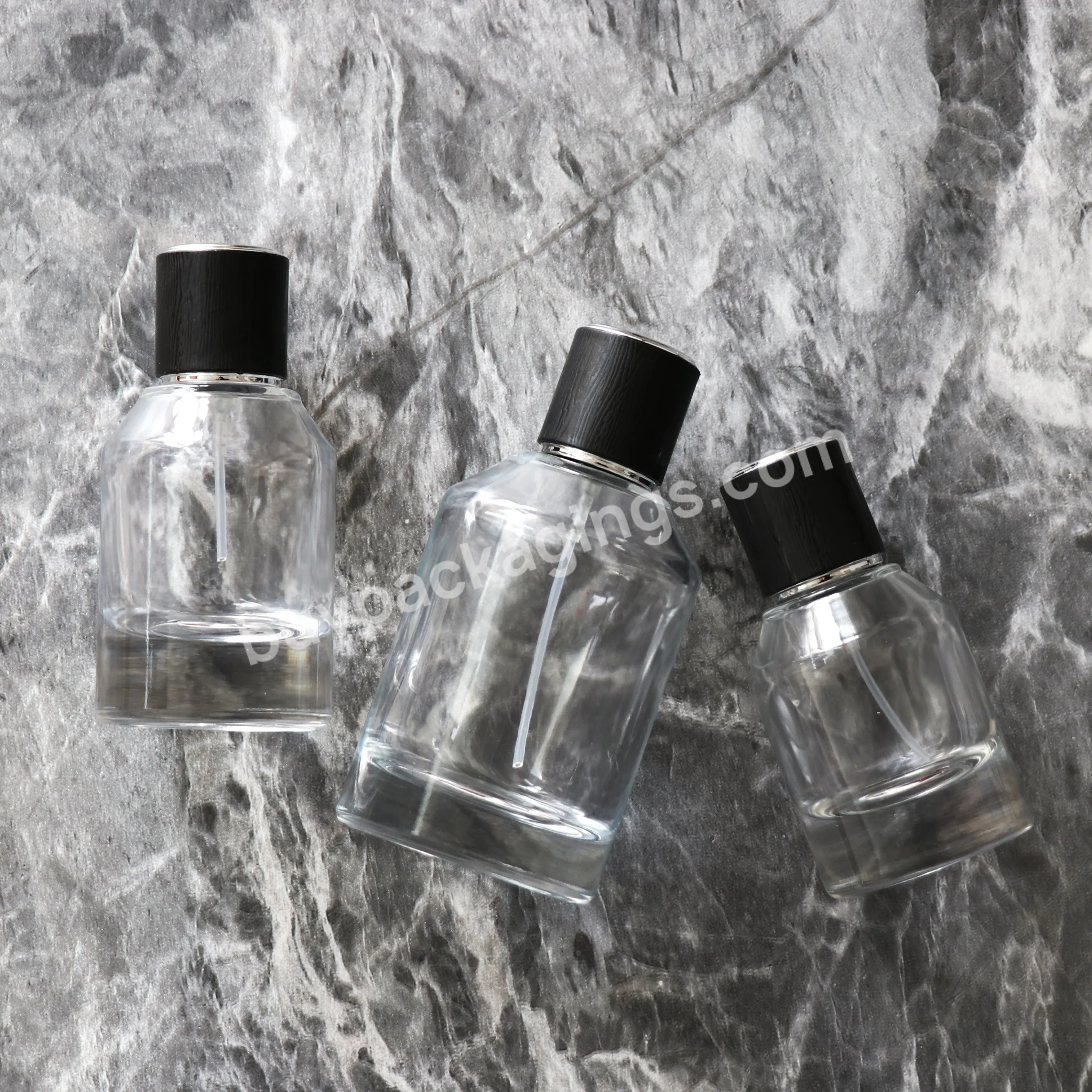 Luxury 30ml 50ml 100ml Oblique Shoulder Clear Glass Perfume Bottle With Pump Spray Cap
