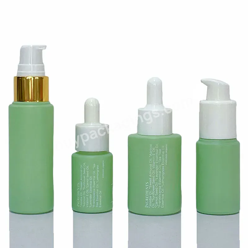 Luxury Cosmetic Oil Dropper Bottle 1oz 30ml 15ml 50ml Green Frosted Cylinder Glass Serum Bottle With Dropper And Pump