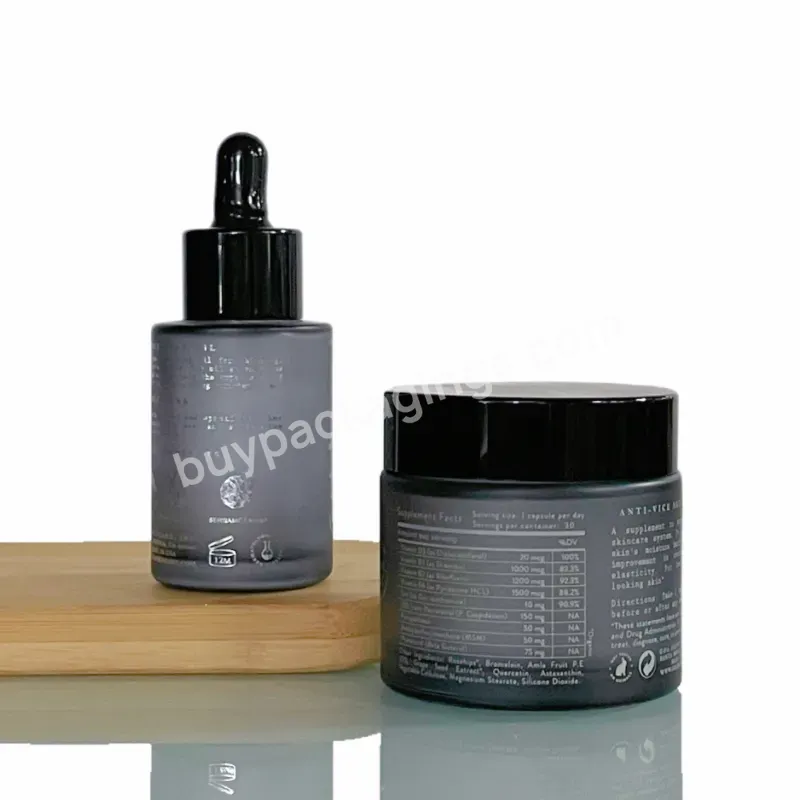 Luxury Cosmetic Skincare Packaging Frosted Black 60g Glass Cream Jar And 30ml Serum Oil Dropper Bottle Sets