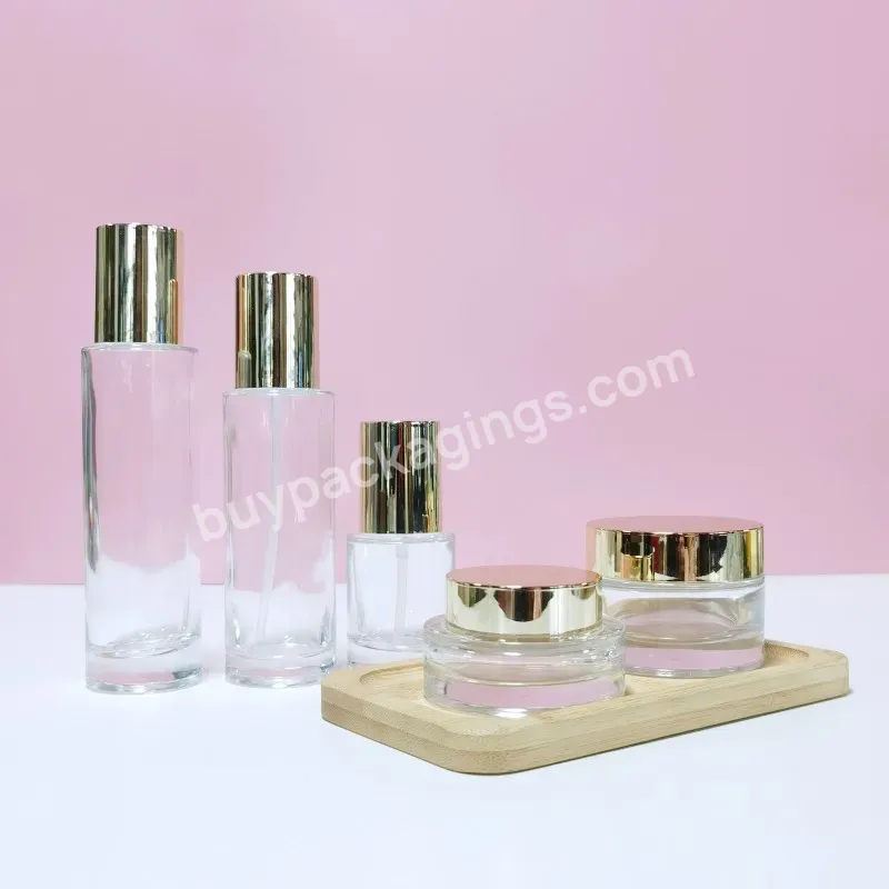 Luxury Gold Skincare Packaging Glass Face Cream Jar And Bottle Set 120ml 150ml 30g 50g Lotion Transparent Cosmetic Glass Bottle